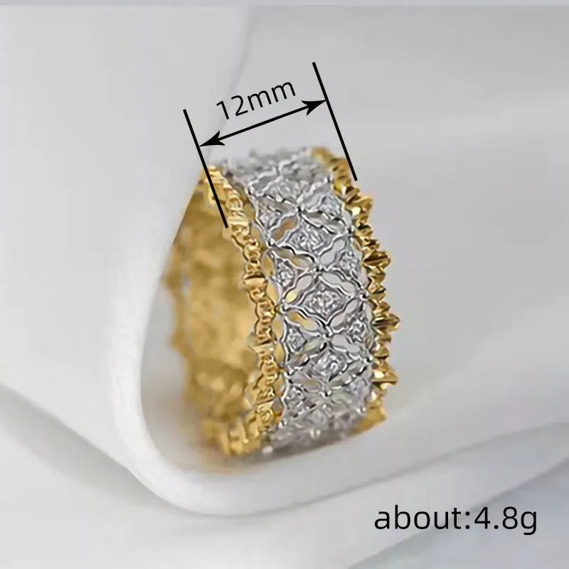 Geometric zircon ring with two-tone gold and silver finish and round centre stone