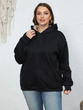 Women's loose-fitting hooded sweater with front pockets in thick polyester fabric