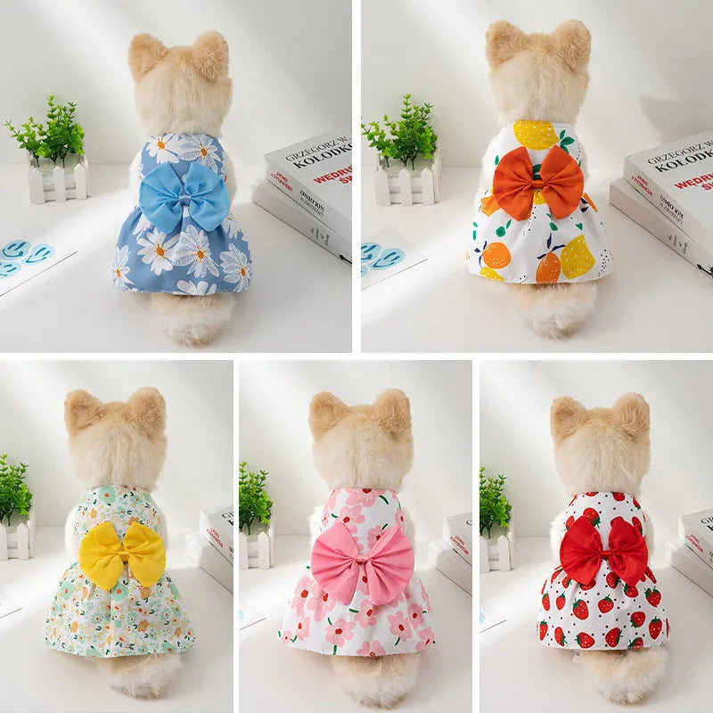 Ultra-thin floral butterfly knot princess dress for a dog or cat, with a decorative bow, on a white background.