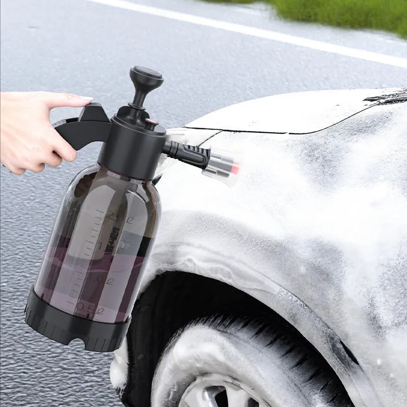 Black hand-held 2 litre spray bottle with two nozzles for garden watering and car washing