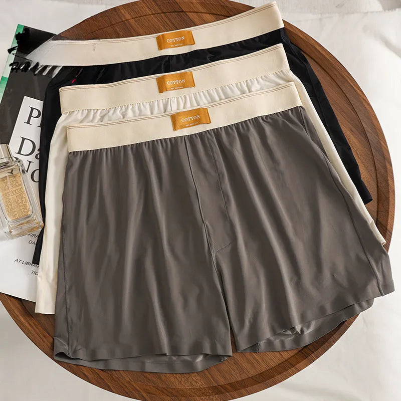 Three pairs of men's solid colour ice silk underwear in loose fit mid-waist design