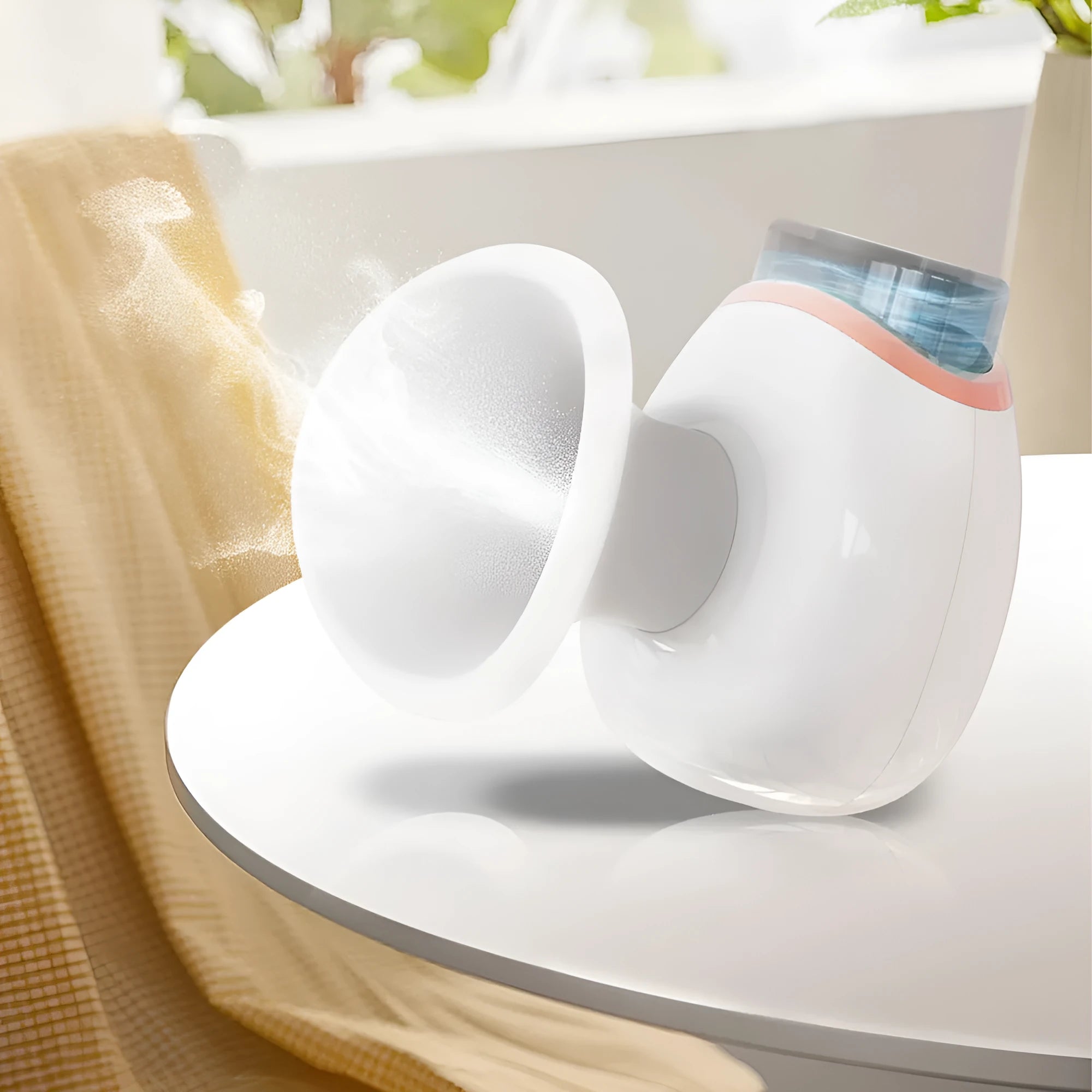 White and purple portable eye humidifier device with USB charging cable on white background