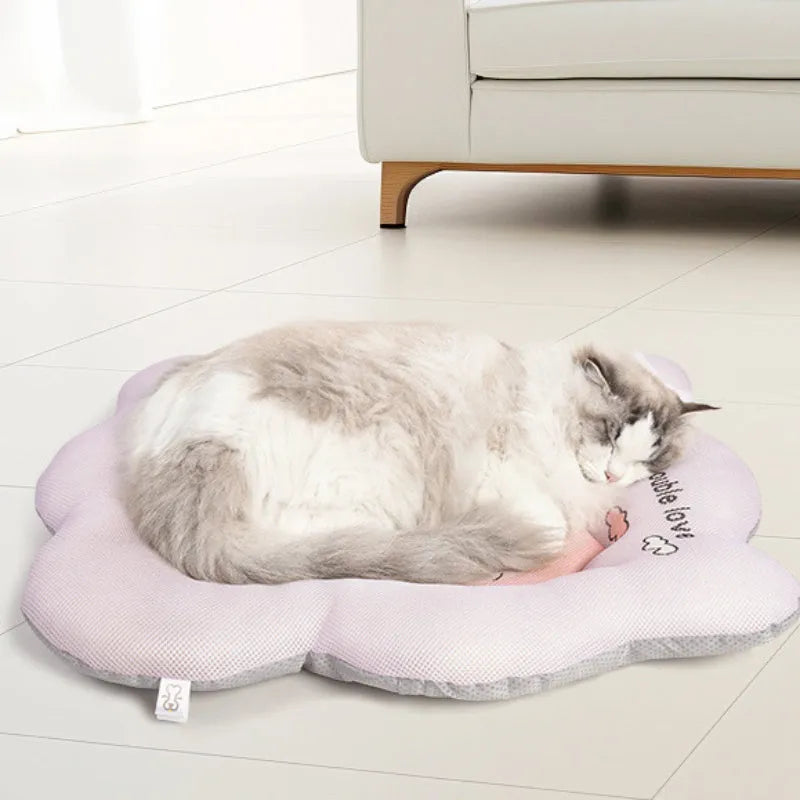 Green ice silk pet cooling mat for a dog, showing size options S, M, L, XL.