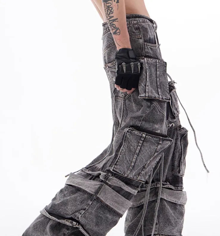 Grey American-style distressed denim overalls with rope stitching on cotton fabric.
