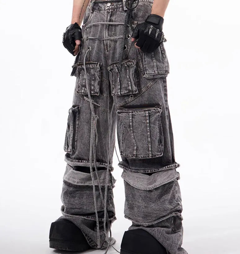 Grey American-style distressed denim overalls with rope stitching on cotton fabric.