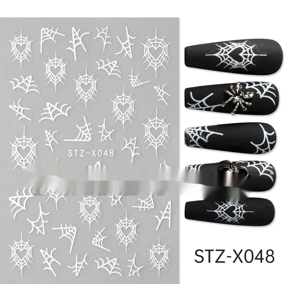 Set of 60 black and silver cartoon pattern nail strip stickers with plastic application patch.