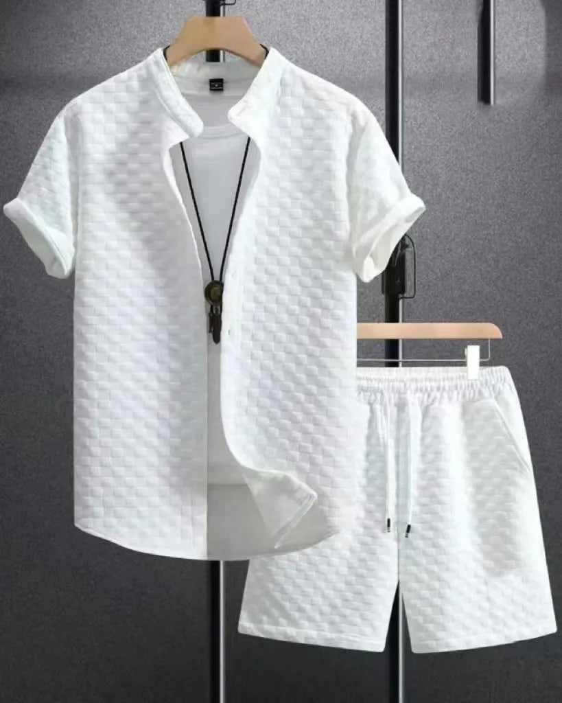 Short sleeve jacket and matching shorts suit set in a solid Jacquard colour on a hanger.