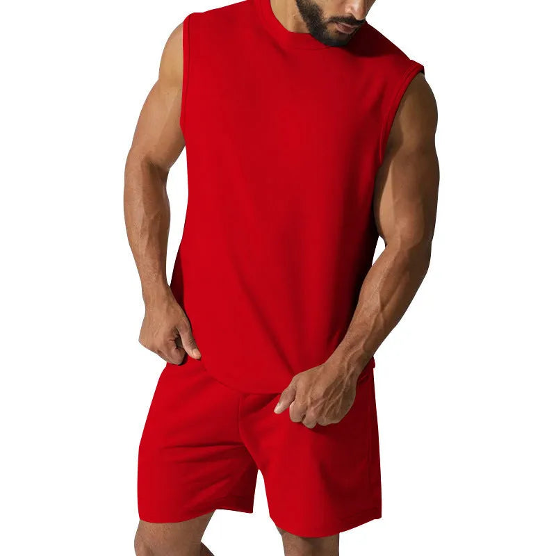 Men's sleeveless cotton-blend sports suit showing matching T-shirt top and shorts in a solid colour.