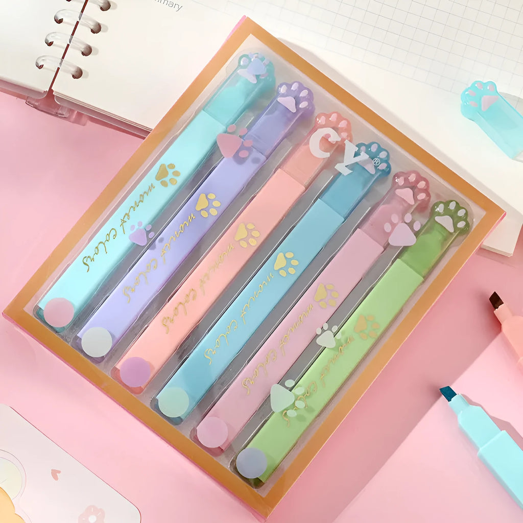 Box of six fluorescent marking pens with plastic shells and oblique nibs in assorted colours.