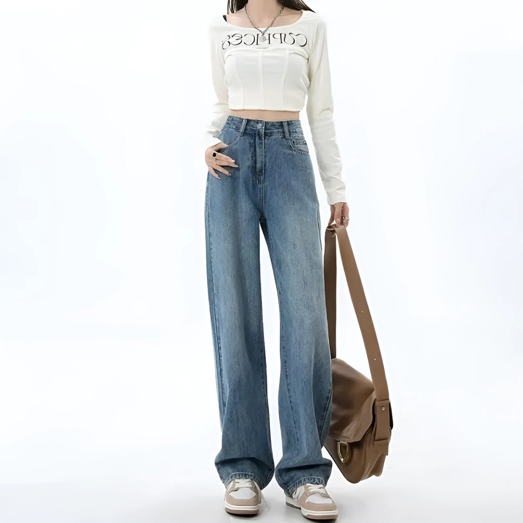 Women's high waist wide leg jeans in retro blue denim with straight leg cut