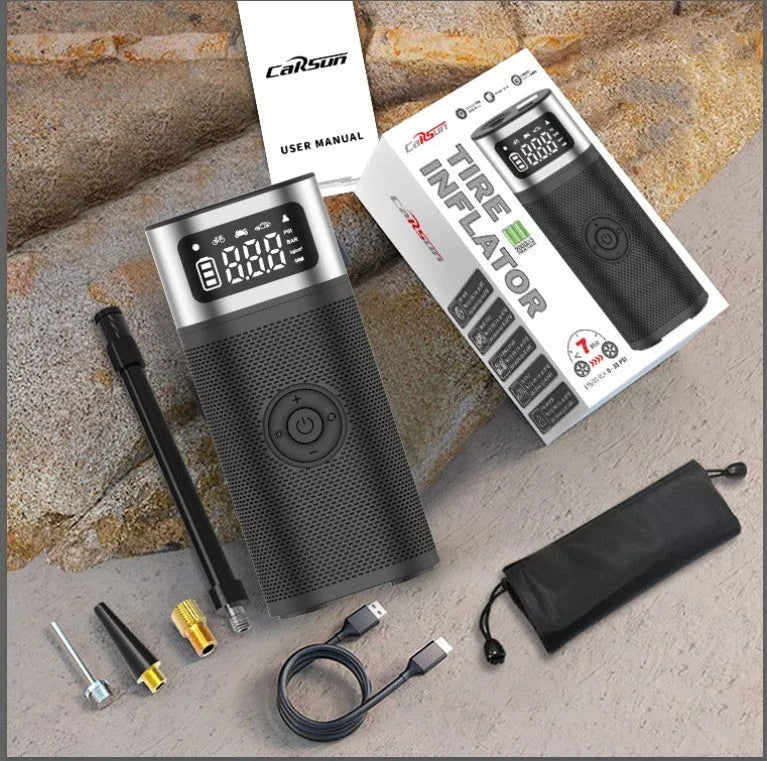 Black portable wireless smart air pump with a 15cm tube and multiple nozzles on a grey background.