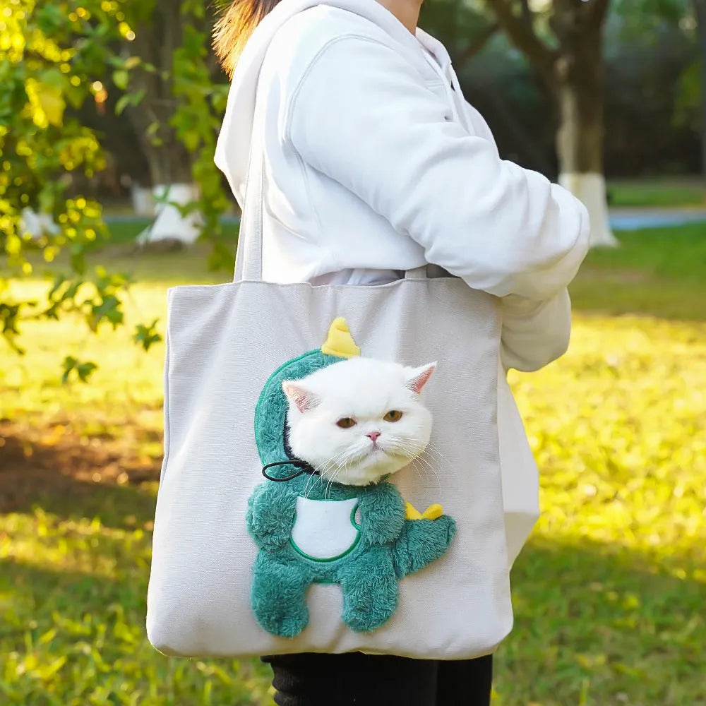 Canvas pet shoulder bag with cartoon pattern for small dog or cat transportation