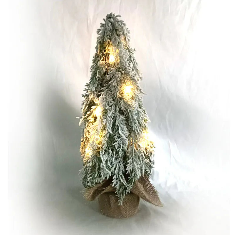 Small 24-inch desktop artificial Christmas tree with white snow sprayer effect and integrated coloured lights
