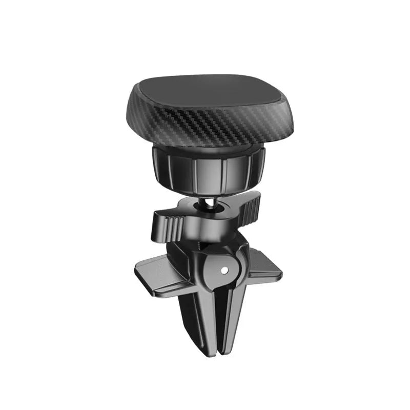 Black magnetic car phone holder mounted in vehicle air vent with mobile device attached