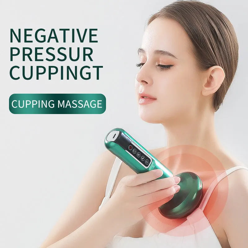 Green electric vacuum cupping massager with USB cable on a table