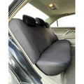 Universal polyester car seat cover set in blue showing headrest and seat panels with eyelet stitching.