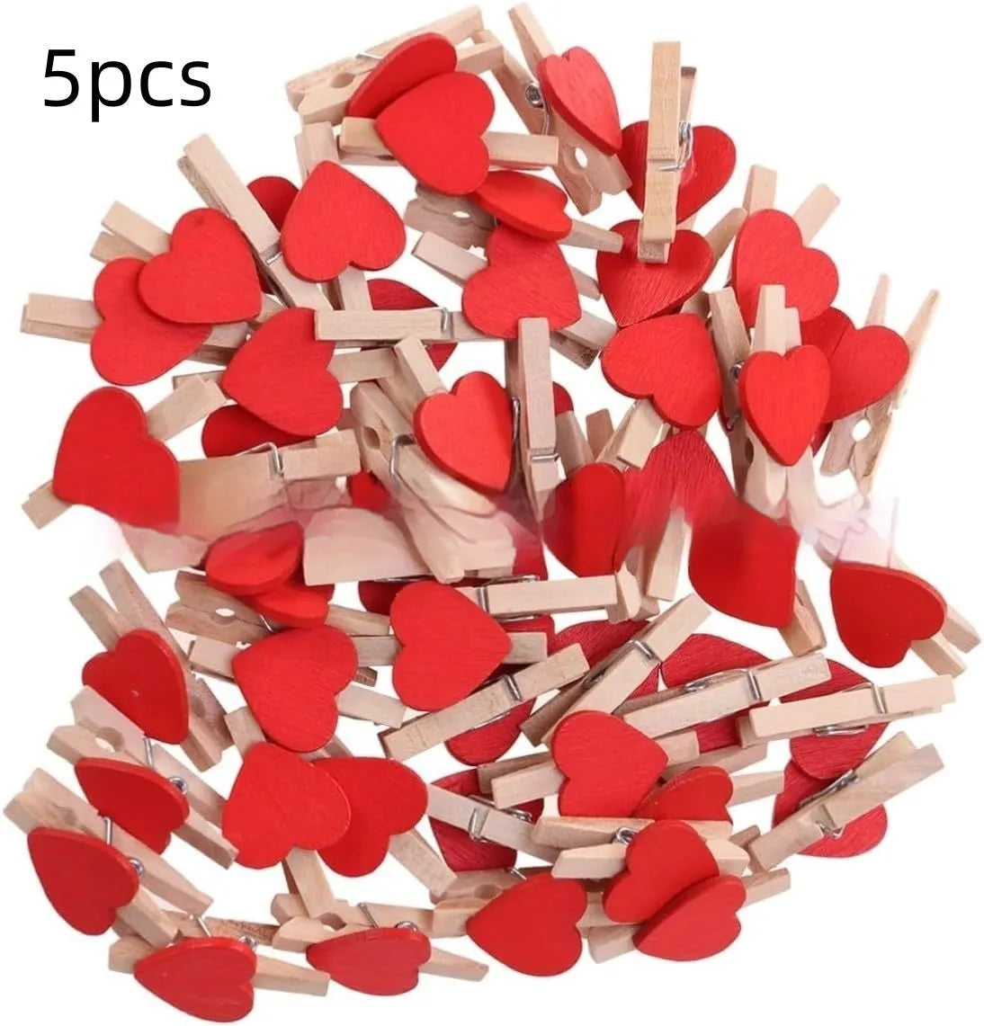 Five wooden heart-shaped hair clips in different colours on white background