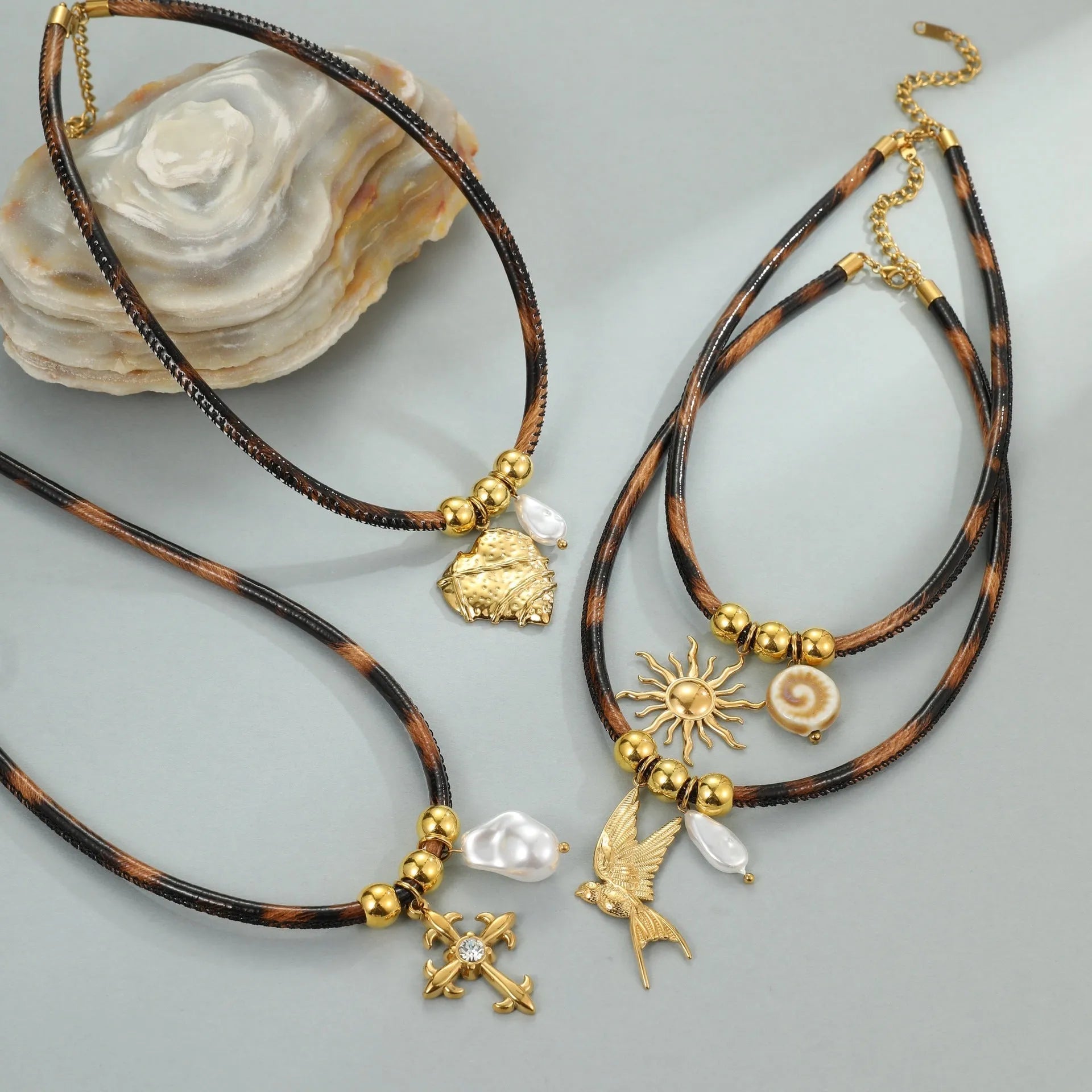 Geometric leopard stainless steel necklace with gold electroplated finish on adjustable 41-50cm chain
