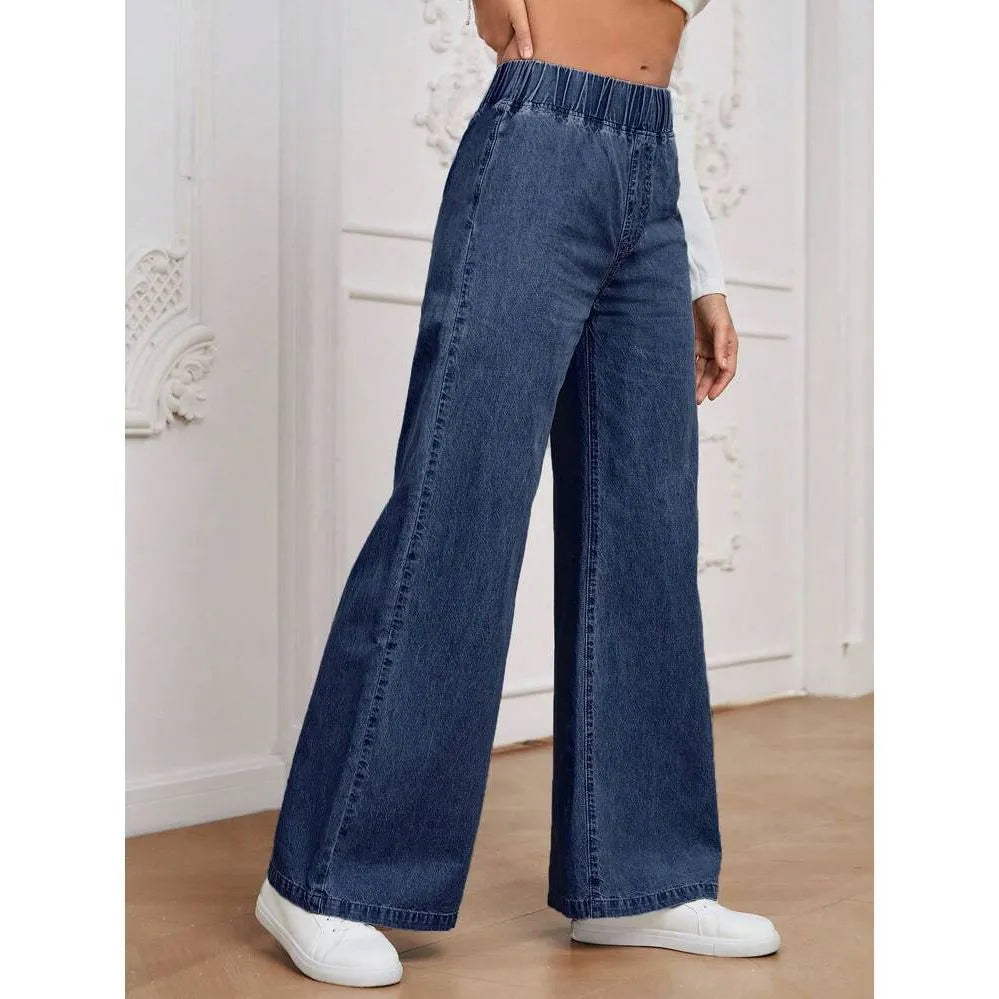Women's light blue washed wide-leg jeans with straight cut trousers and mid-waist zip fly