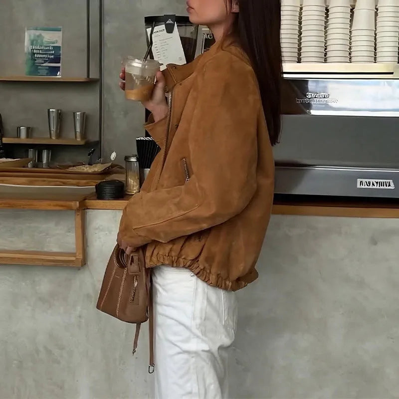 Retro solid colour loose fit polyester jacket with long sleeves on mannequin