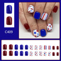 Short glossy red and blue nail stickers with strawberry and cherry patterns - 24 piece set