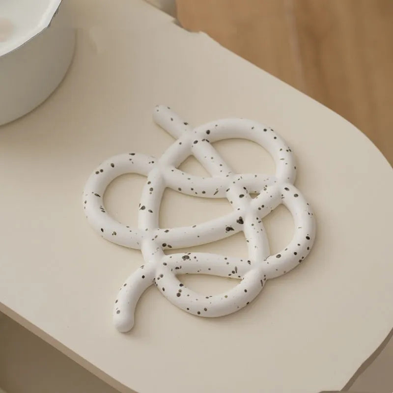 Ceramic heat proof mat with irregular shape for dining table protection