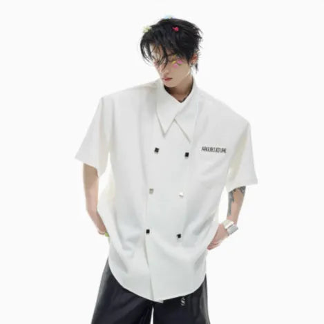 Men's loose fit short sleeve casual shirt with spliced panelling and metal button details.