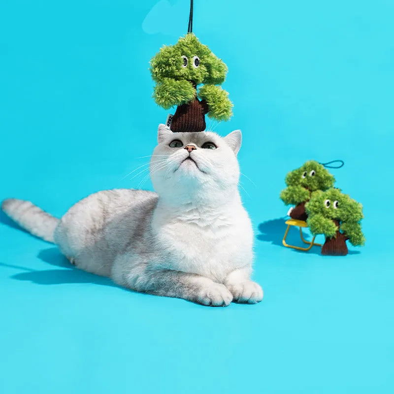 Pine tree shaped cat chew toy with fabric detail in three size options for feline dental enrichment