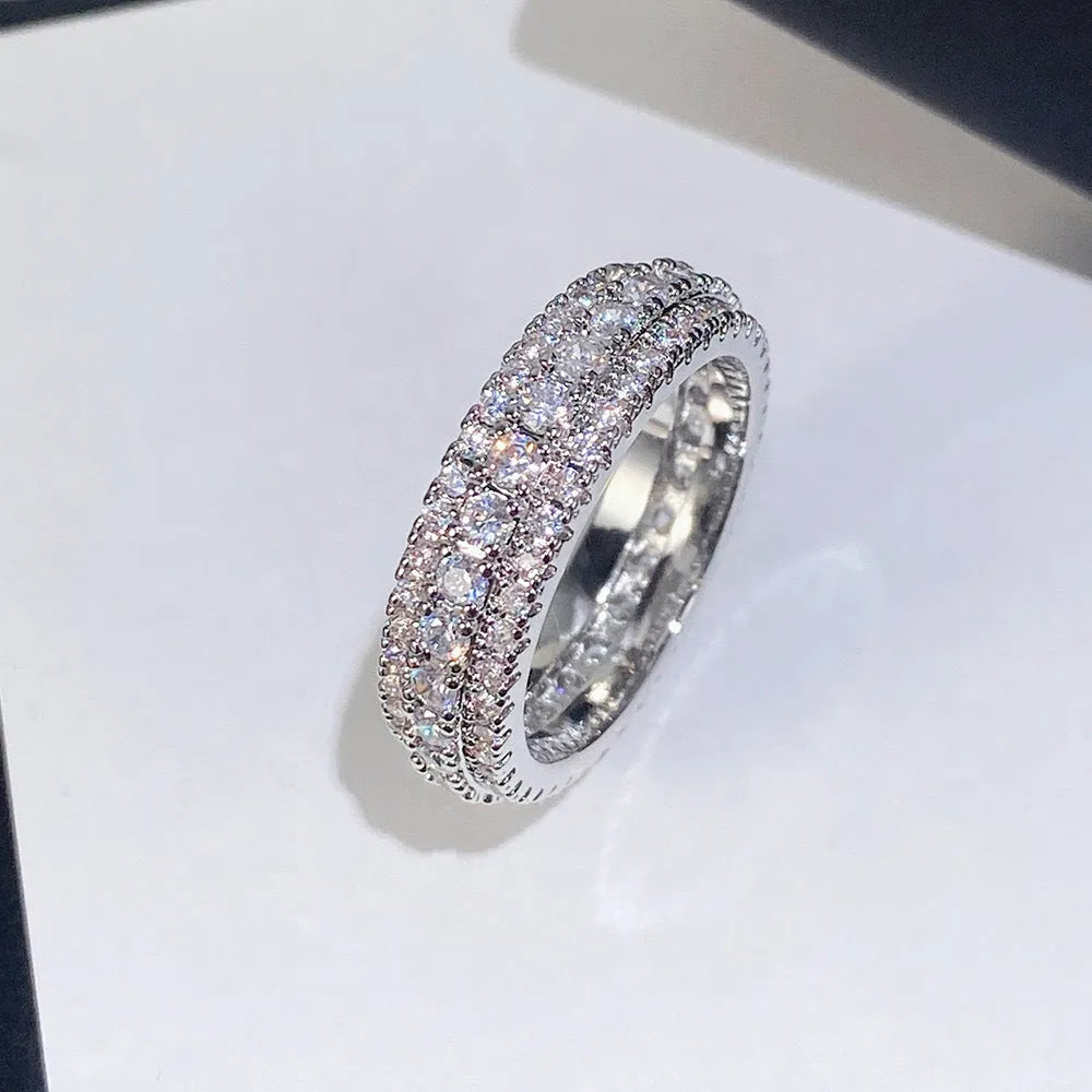 Geometric copper ring with triangular zircon stone inlay in white gold finish