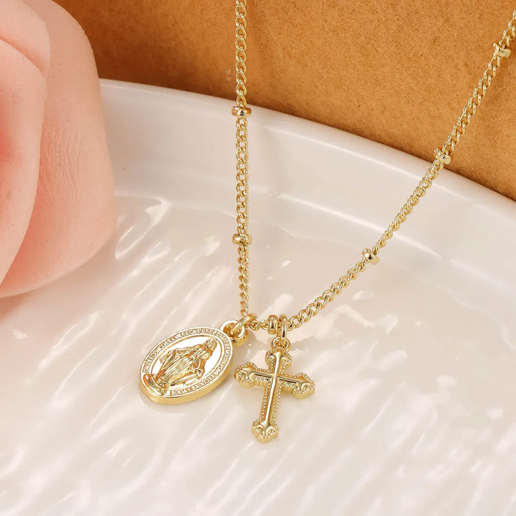 Gold cross pendant necklace with Virgin Mary ornament on geometric 2.5 cm pendant