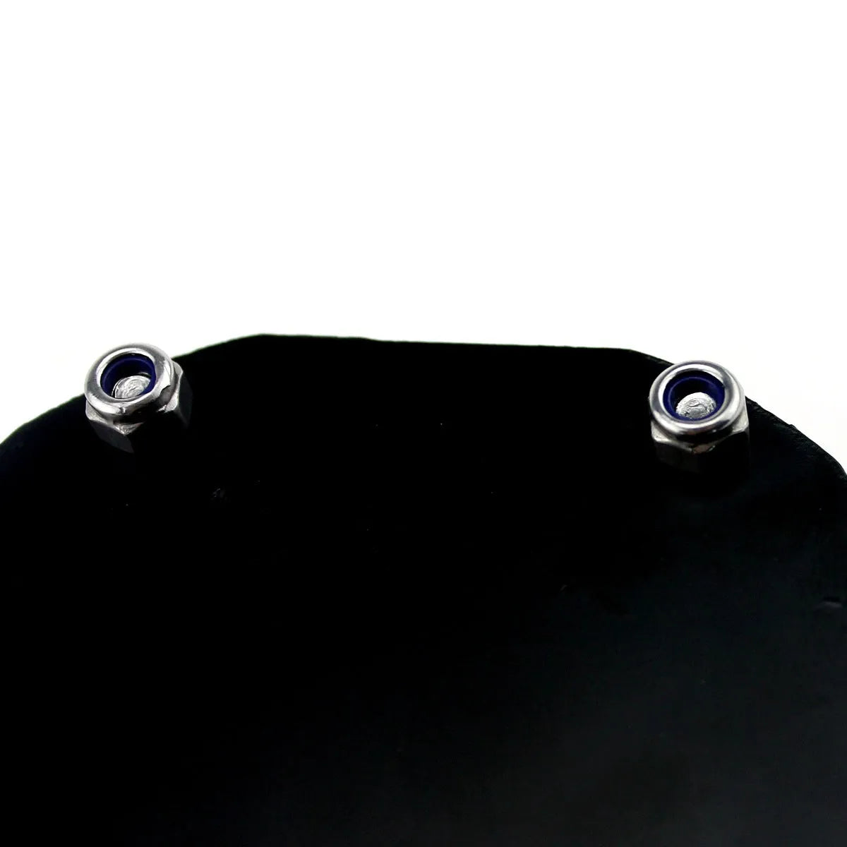 Black carbon fibre pattern motorcycle tax seal with six-corner screw measuring 100x7mm