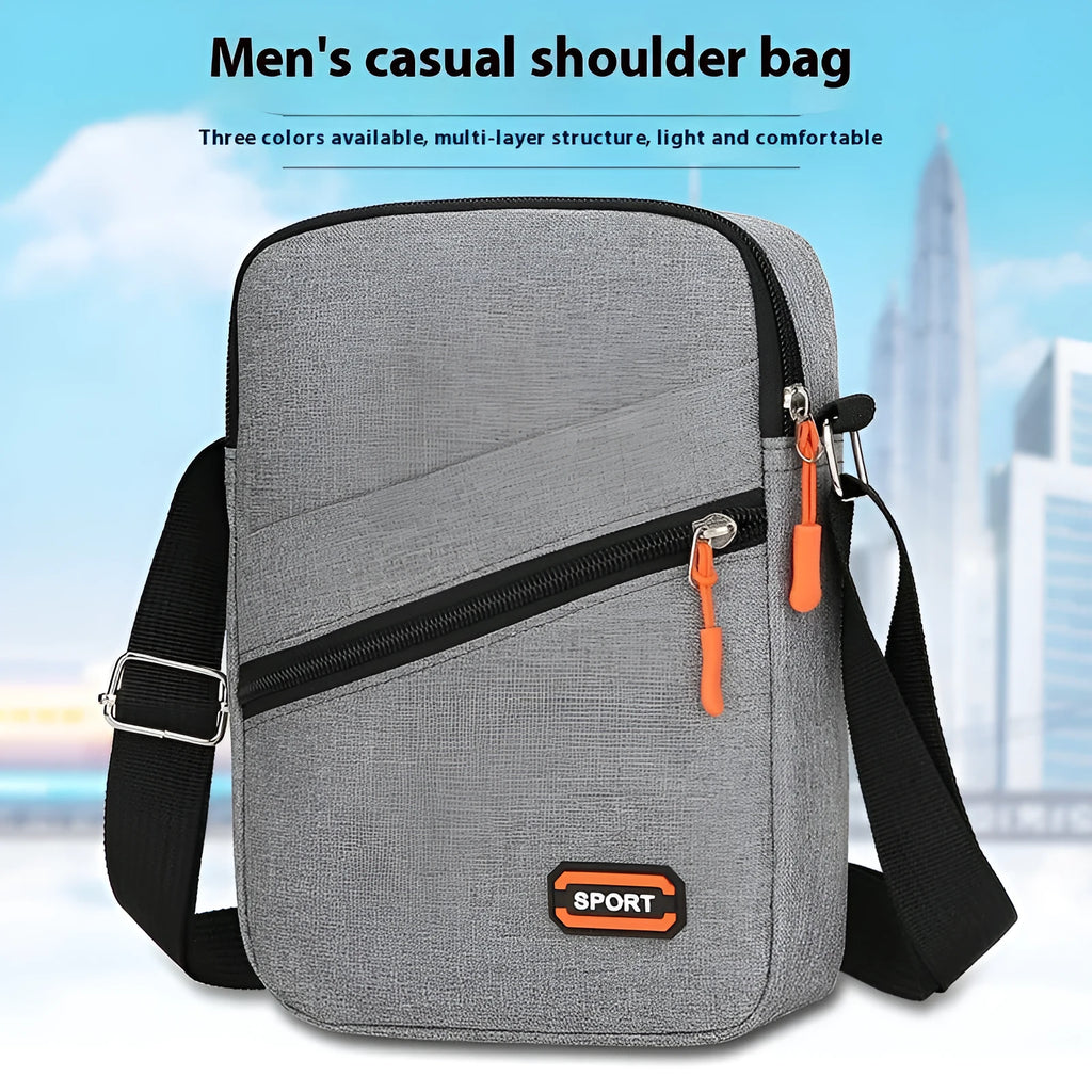 Ultra-light Oxford cloth crossbody commuter bag in black, navy blue, or silver grey with contrast colour detailing.