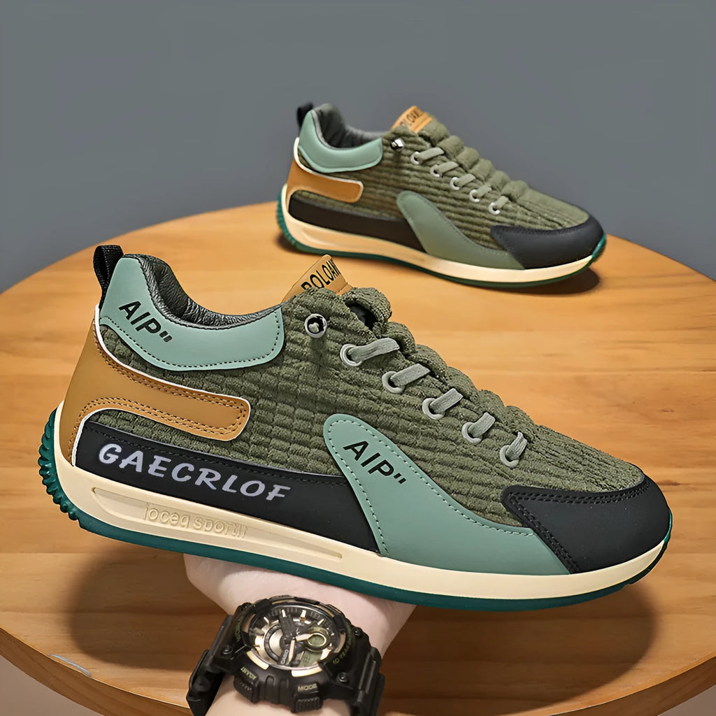 Men's grey and green mesh running shoes with lace-up closure and round toe design