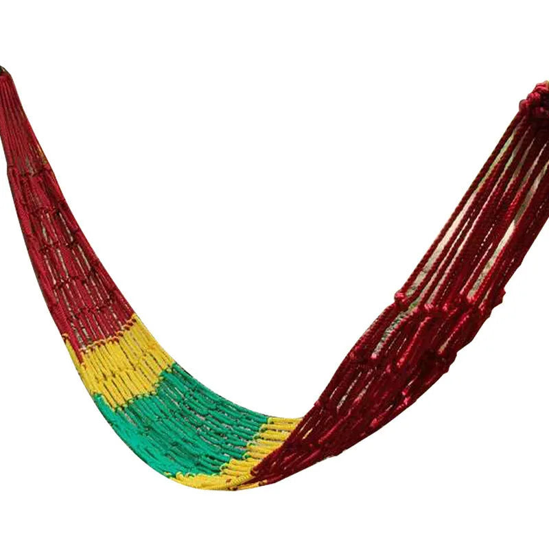 Outdoor nylon rope mesh hammock hanging between two trees showing mesh pattern and included tying ropes
