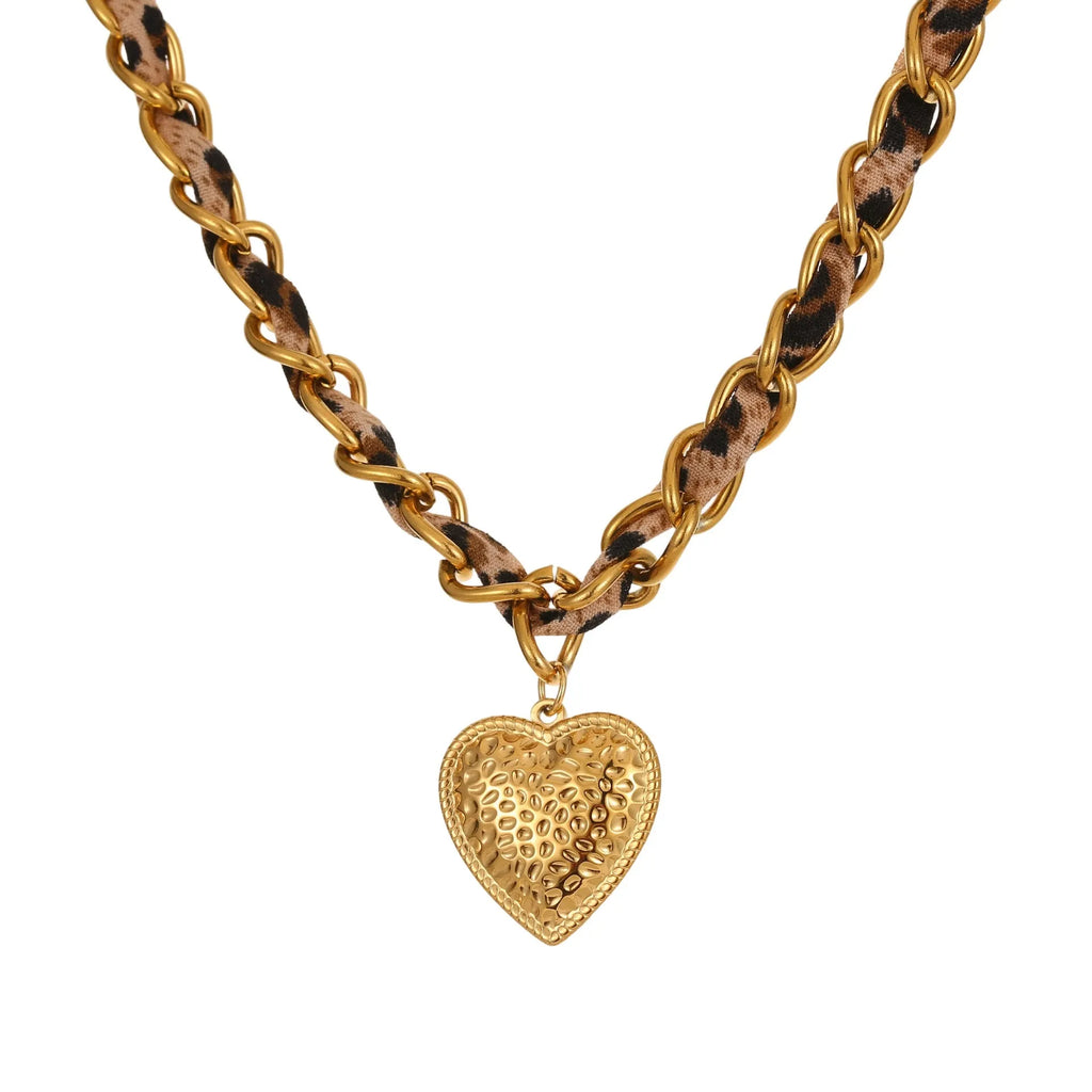 Stainless steel necklace with geometric leopard and heart pendant on adjustable chain