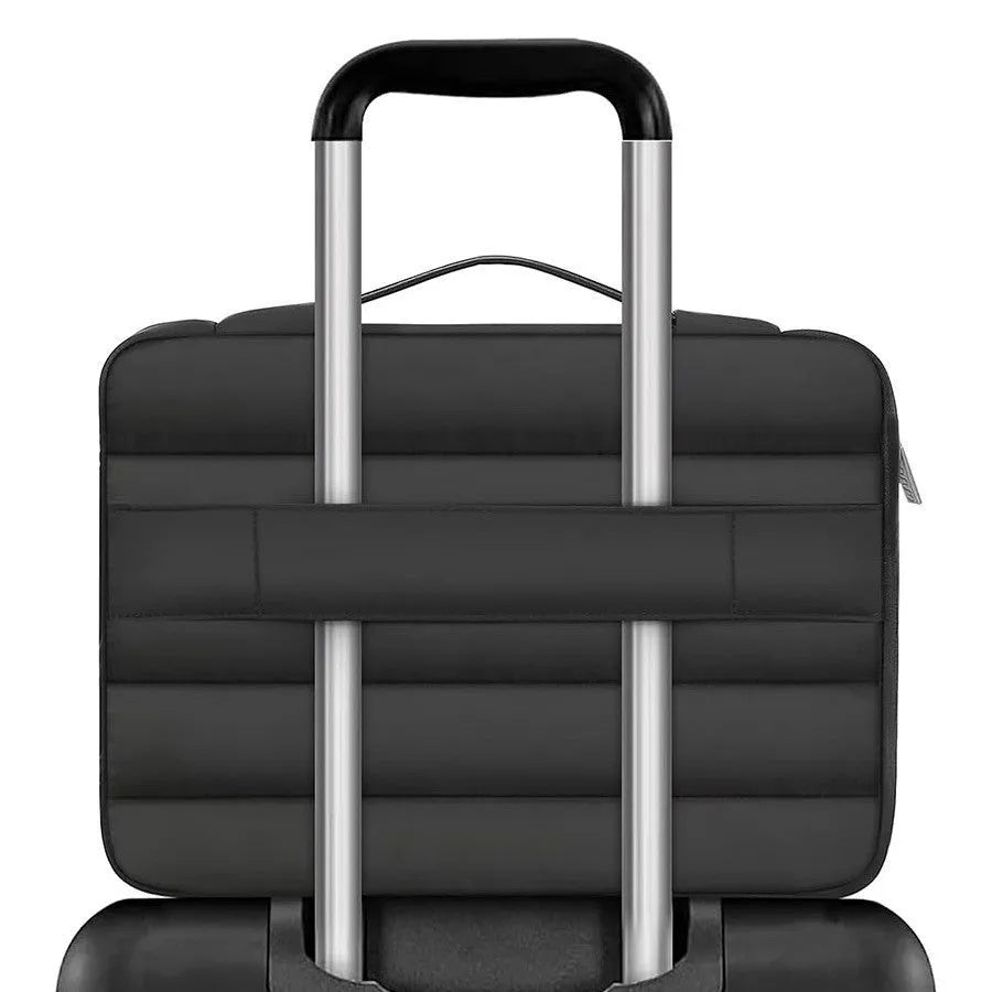 Black velvet laptop bag with plaid trim, shown next to a 15.4-inch laptop for scale.