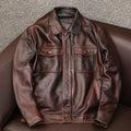 Men's black loose-fit PU leather jacket with lapel collar and side pockets for plus-size frames.