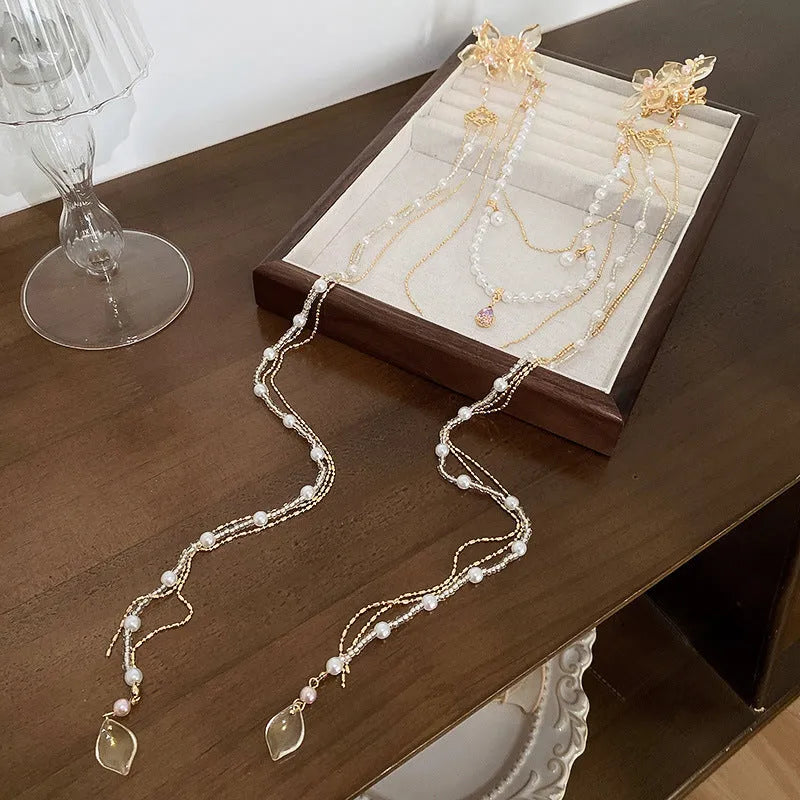 Gold women's hairpin with pearl diamond flower decoration and long tassels
