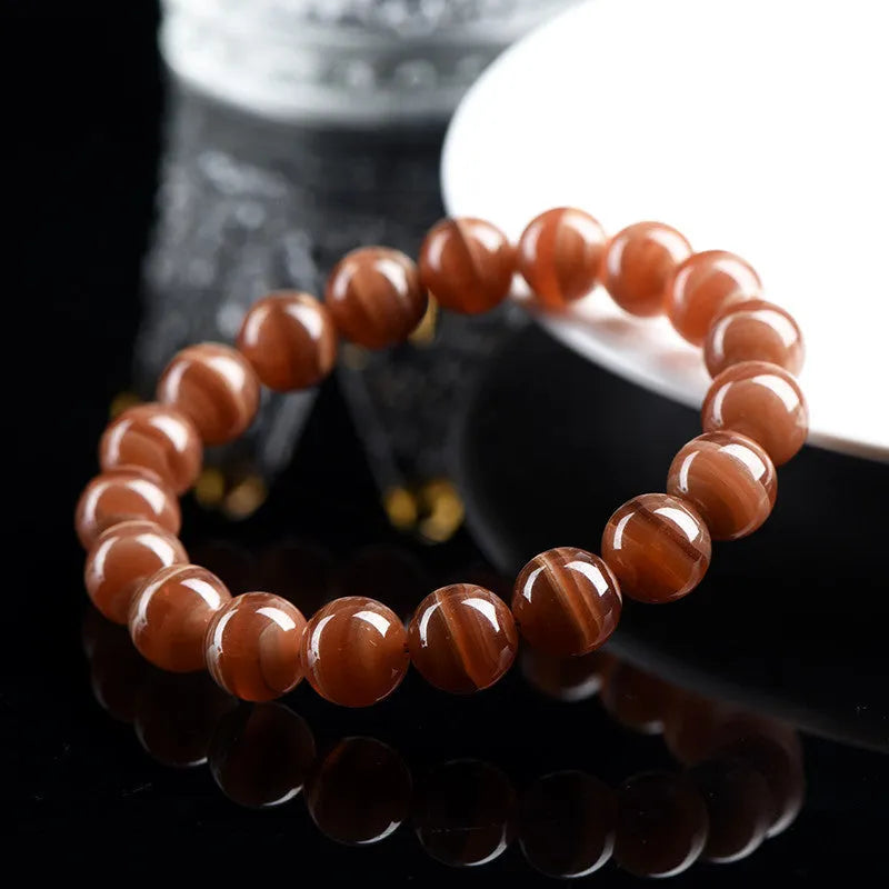Natural Old Mine Rhodochrosite round beads bracelet with geometric Ruyi design elements