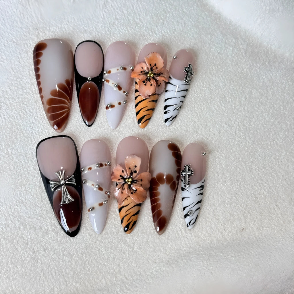 Set of ten French style nail stickers featuring leopard print, cross, and flower patterns in sizes XS, S, M, L.