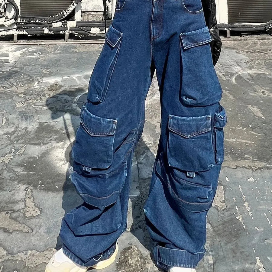 Dark blue distressed women's wide-leg jeans with a high waist and multiple pockets.