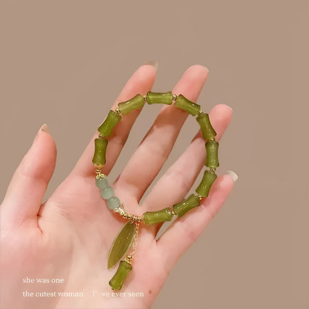 Handmade Chinese style glass women's bracelet featuring bamboo joint design elements.