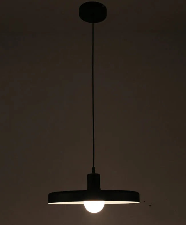 Aluminium alloy pendant chandelier light fitting in black, shown in a restaurant setting.