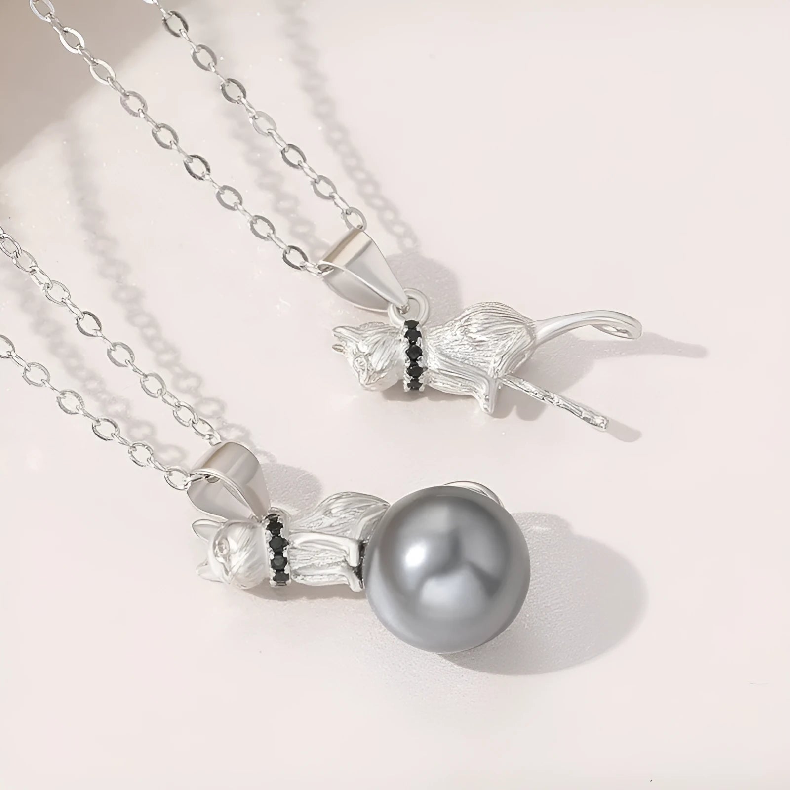 925 sterling silver cat pendant necklace with electroplated finish available in single pendant or full chain set options