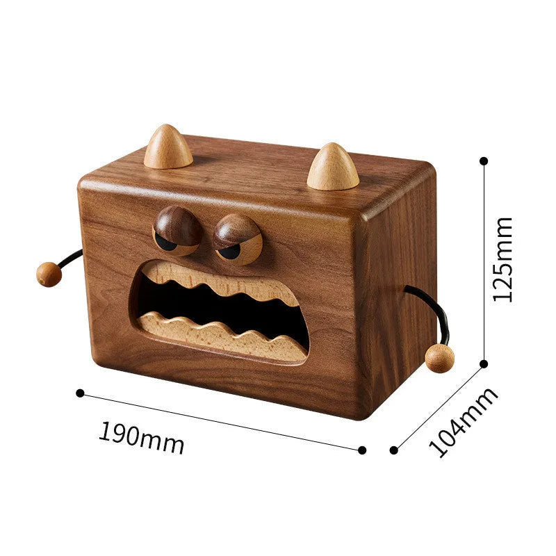 Wooden tissue box with cartoon monster design in walnut beech colour measuring 190x104x125mm