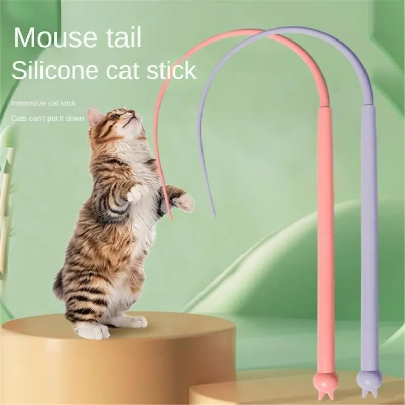 Blue cat teaser stick with long silicone tail and cat head design handle on a plain background.