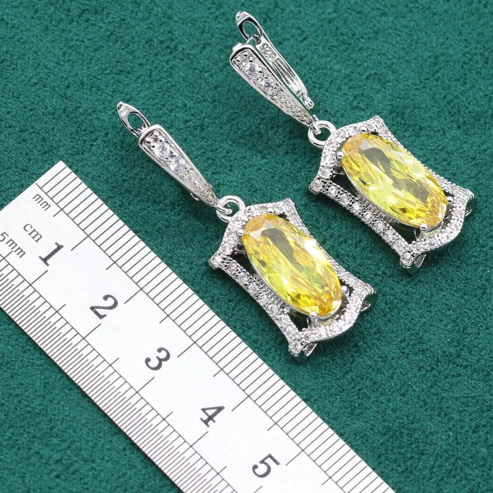 Zircon jewellery set with anti-allergy properties showing necklace, earrings, ring, and bracelet in olive green colour