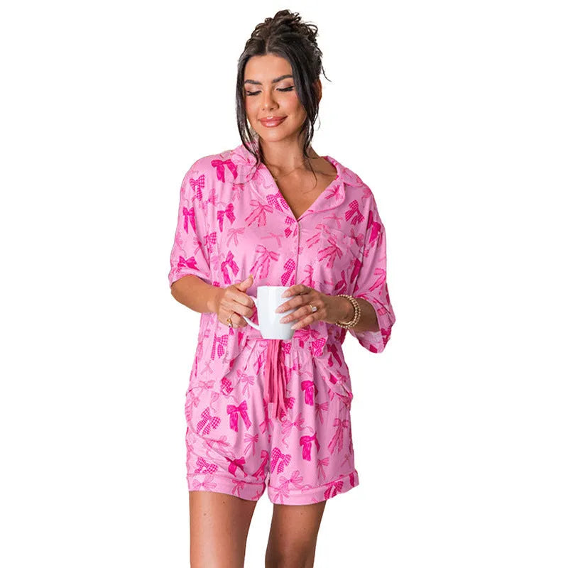 Women's pink bow print two-piece pajama set with simple casual style