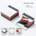 3D Sticky Notes pad with a carved paper Christmas Train design on the cover.