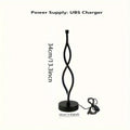 Black aluminium desk lamp with touch dimming button showing three colour temperature settings
